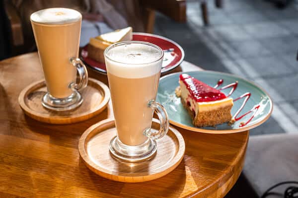 oat milk latte and cheesecake 