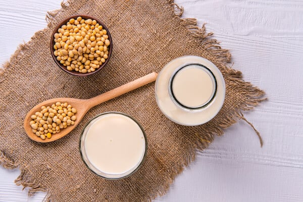 Soy milk jug and soybeans