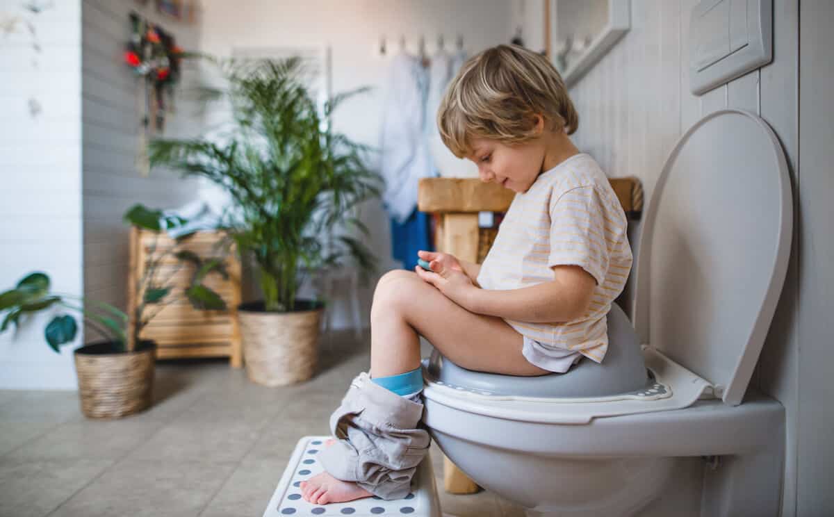 little boy on the toilet